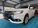 Mitsubishi Outlander PHEV Plus 4WD*2.Hand*Navi*Leder - gebrauchte Mitsubishi Outlander aus dem Jahr 2016