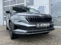Skoda Karoq 1.5 TSI DSG Sportline PANO KAM AHK 4JGAR bei Autohaus Landmann & Maier OHG
