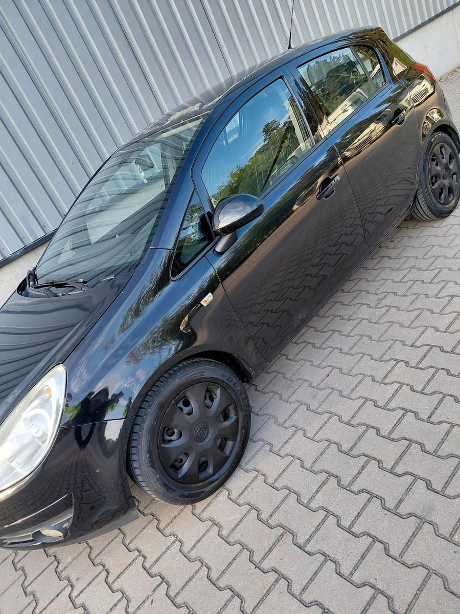 Opel Corsa 2009 — rear view