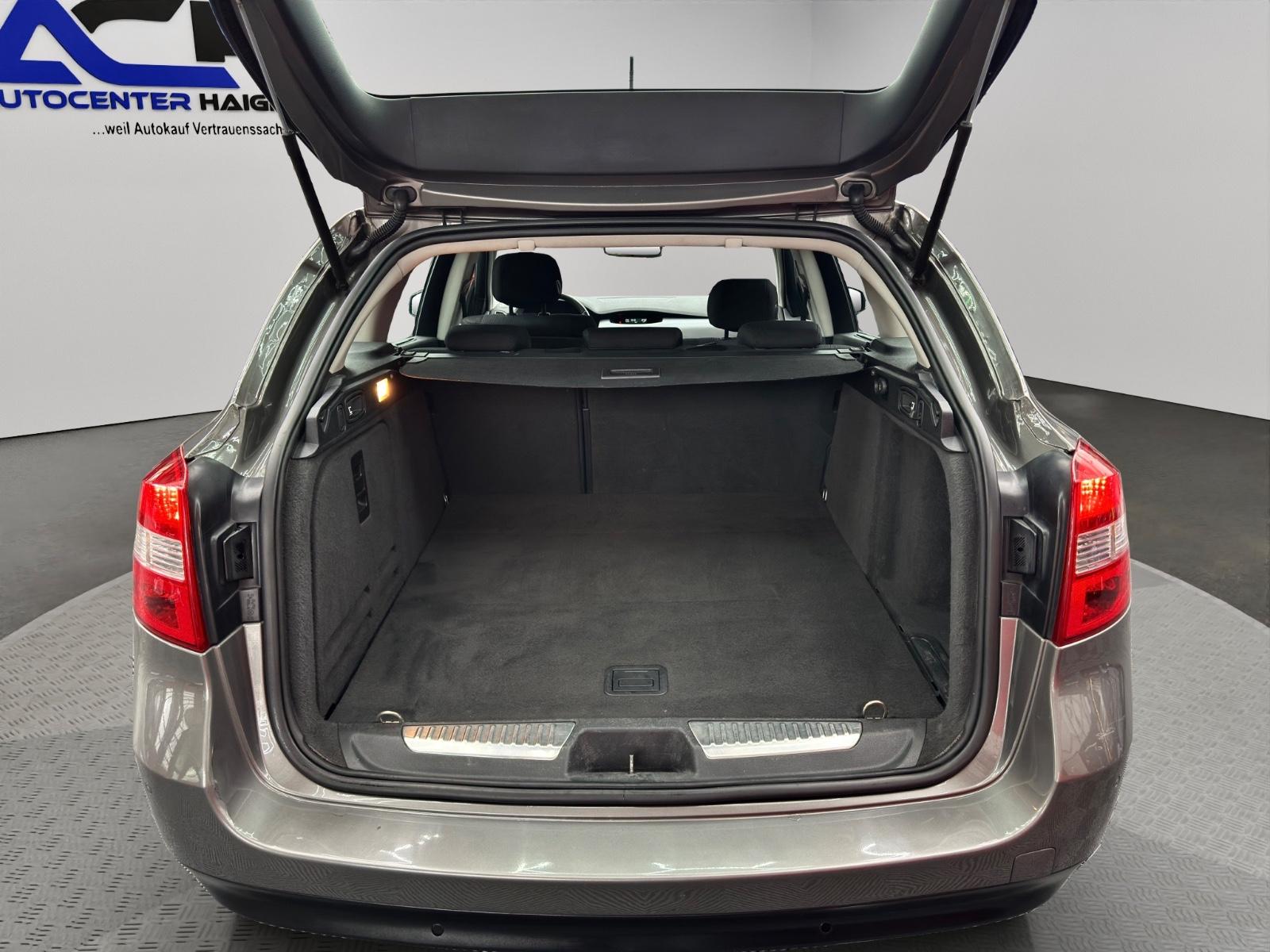 Renault Laguna 2009 — photo 19