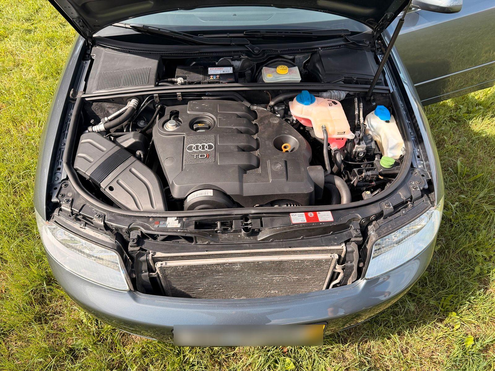 Audi A4 2004 — photo 14