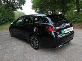 Toyota Corolla 2,0 Hybrid Team Deutsch Touring Spor... - Toyota Corolla mit Benzin-Antrieb: Kombi