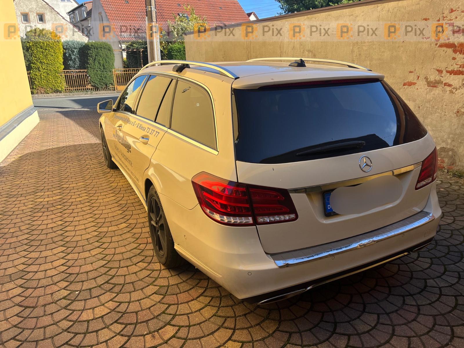Mercedes-Benz E200 2014 — rear view