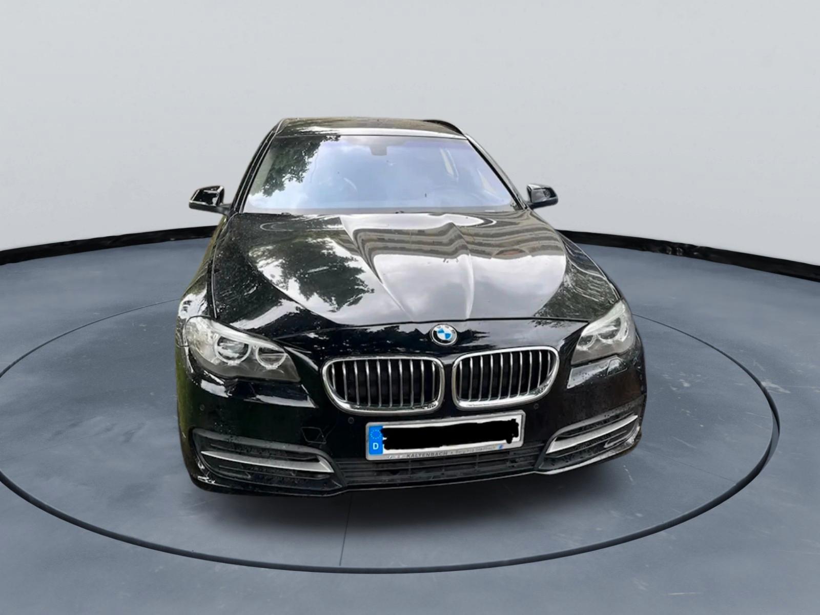 BMW 520 2014 — rear view