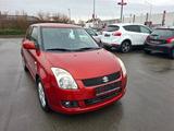 Suzuki Swift Lim. Club - Suzuki Swift mit Benzin-Antrieb: Orange