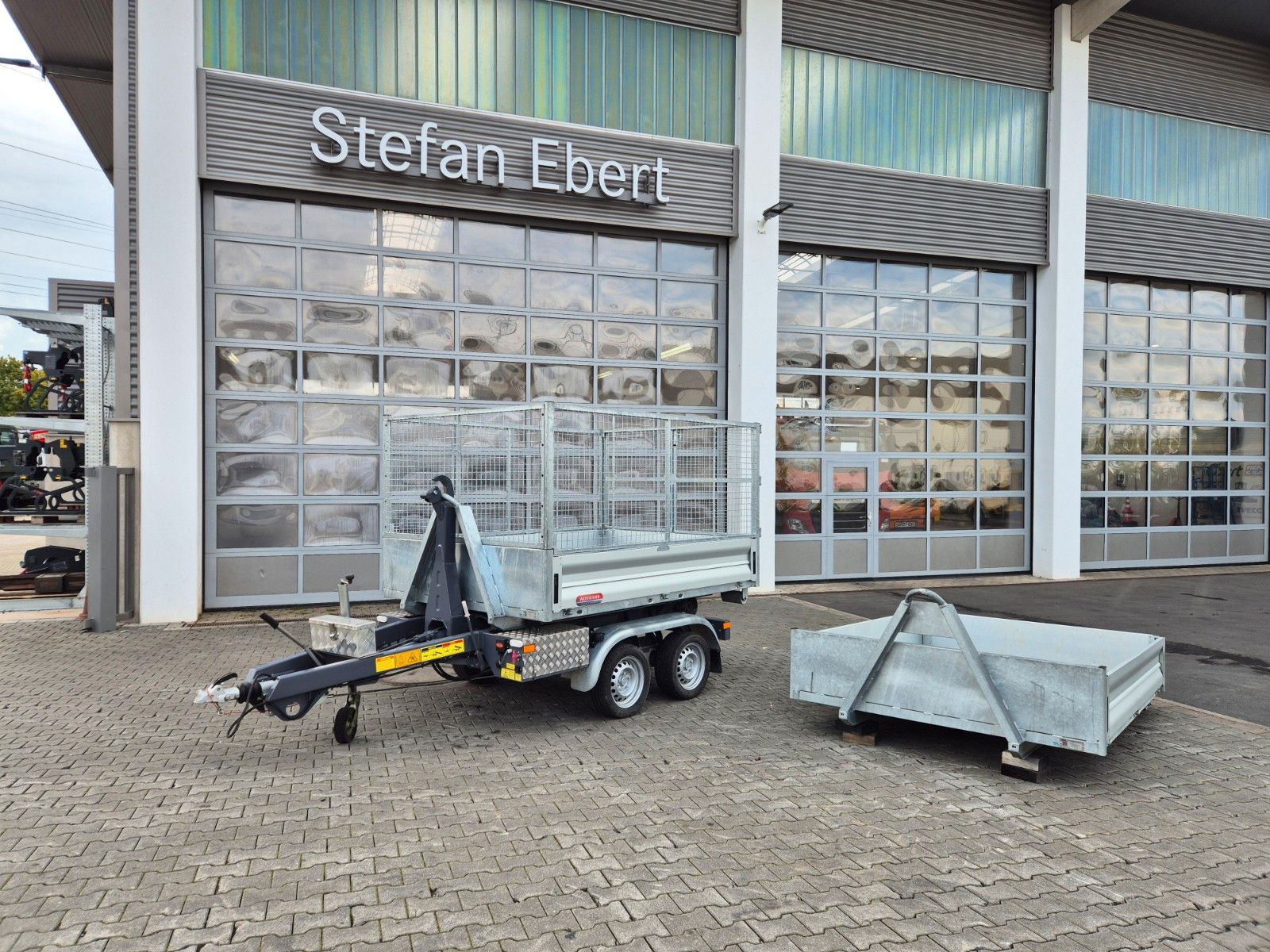 Fahrzeugabbildung Wörmann Abrollkipper Mulde Gitterbox