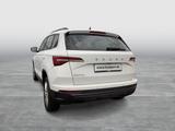 Skoda Karoq 1.5 SELECTION AHK CAM NAVI CARPLAY SITZHZ. - weiße Skoda Karoq