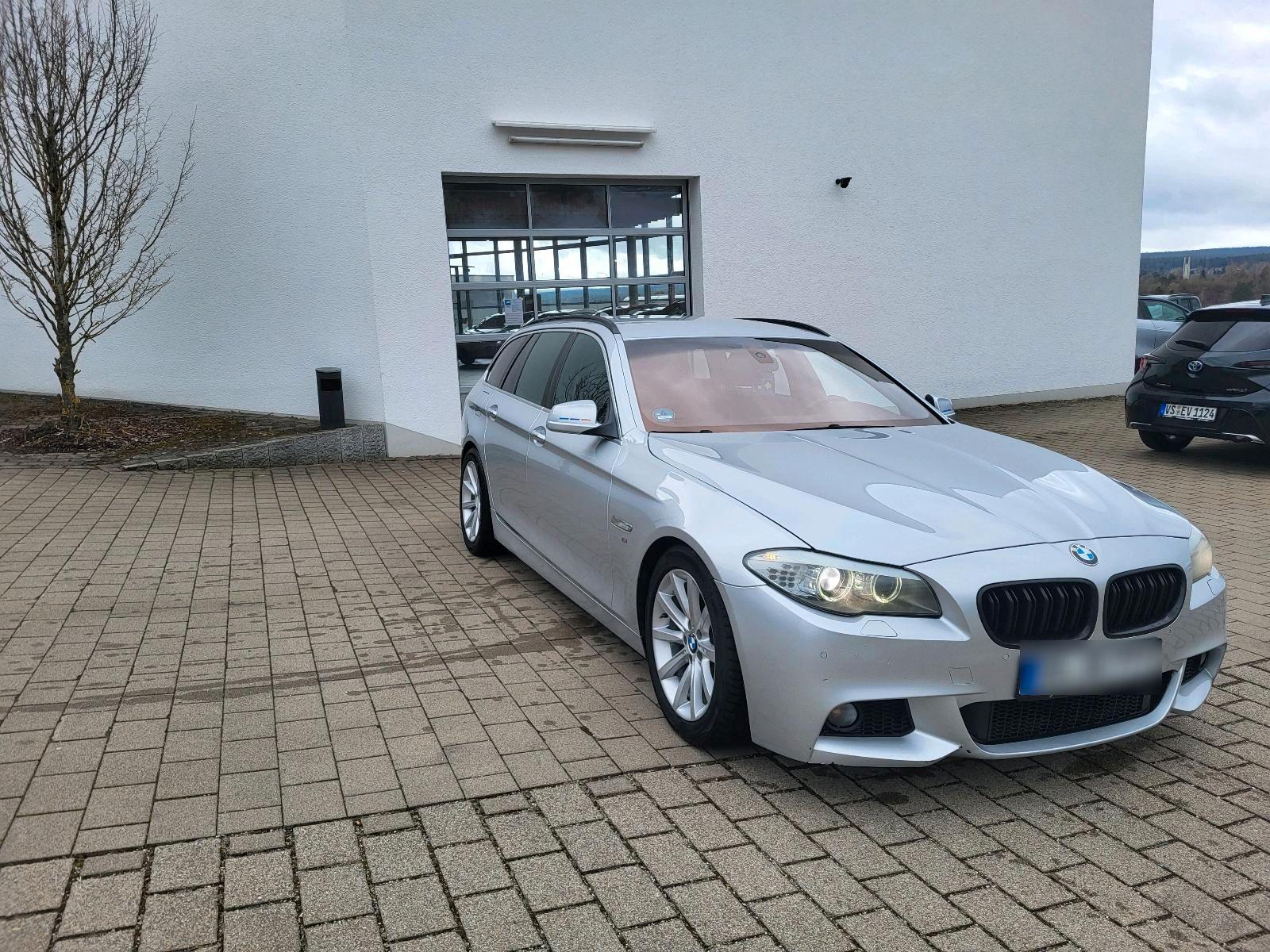 BMW 525 2011 — rear view