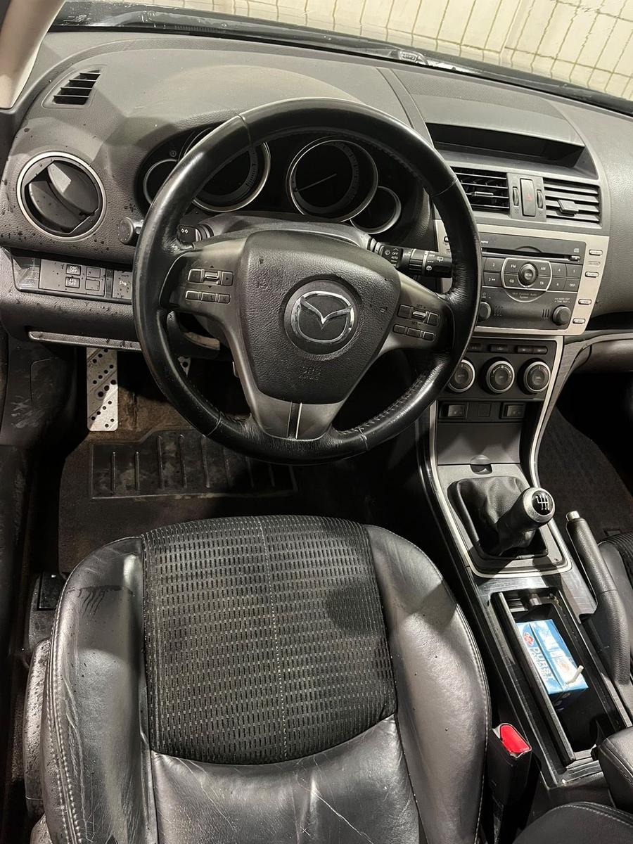 Mazda 2 2008 — photo 9