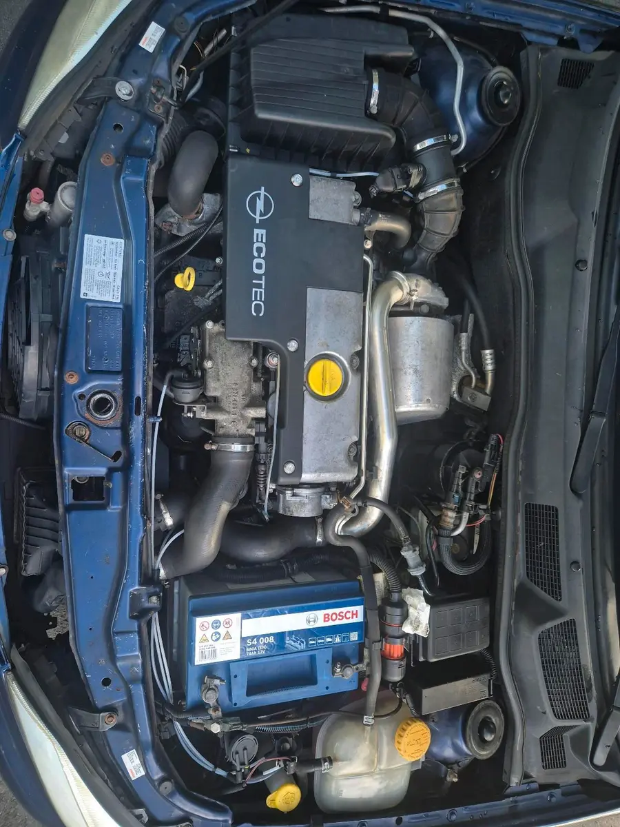 Opel Astra 2004 — photo 13