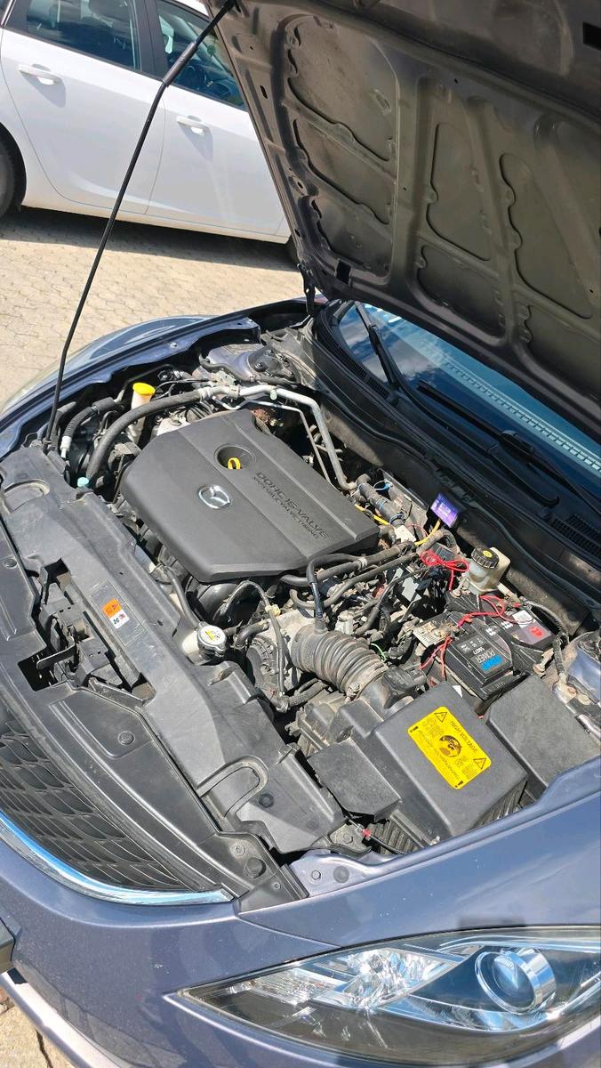 Mazda 2 2009 — photo 13