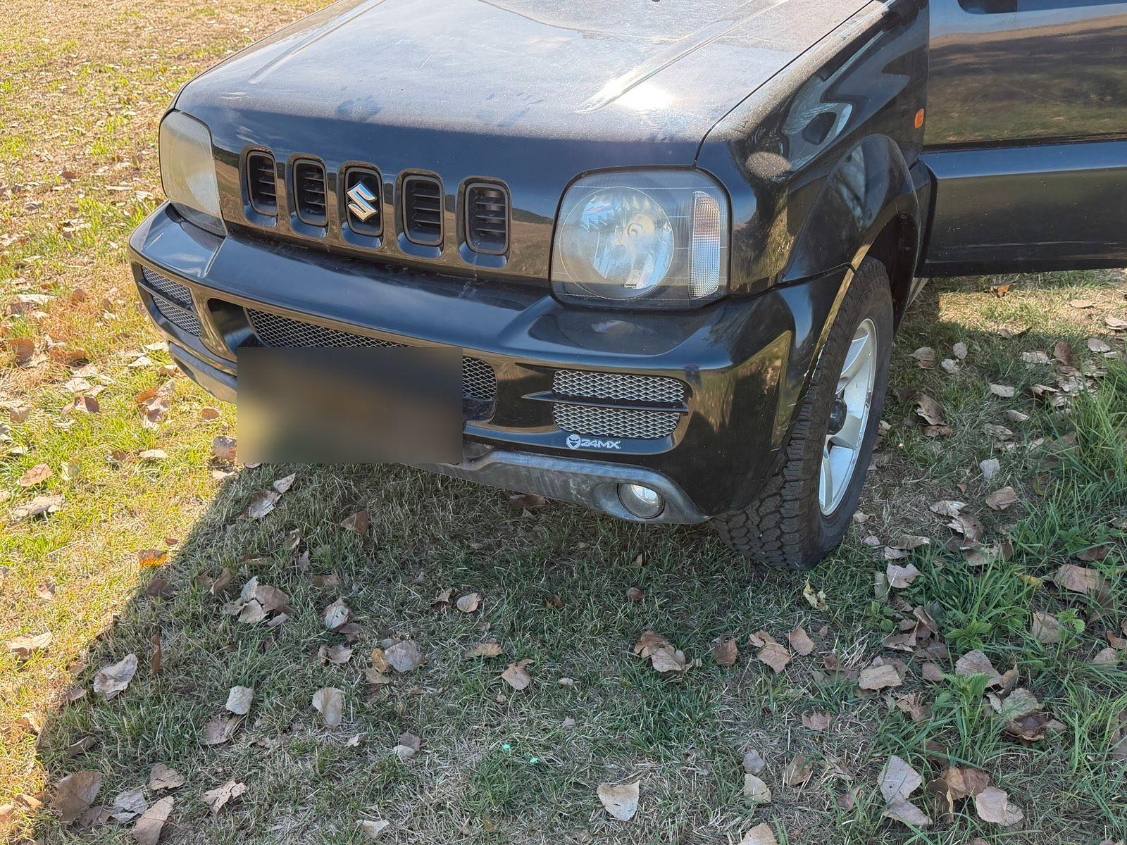 Suzuki Jimny 2006 — вигляд ззаду