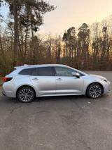 Toyota Corolla 2,0 Hybrid Team Deutsch Touring Spor... - Toyota Corolla mit Benzin-Antrieb: Automatik