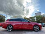 Opel Astra ST 1.6 Hybrid Ultimate Assi./AHK/Alcantara - Opel Astra: Rot