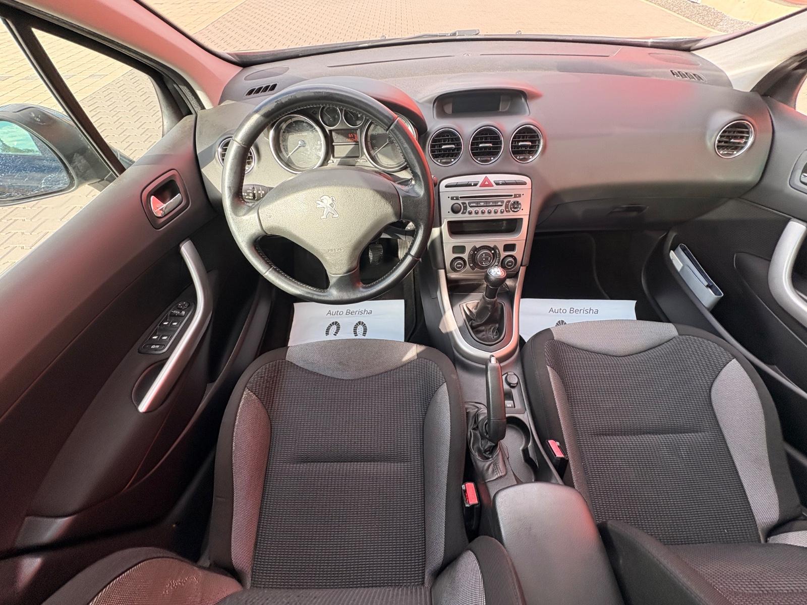 Peugeot 308 2012 — photo 17