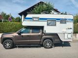 Volkswagen Amarok mit Nordstar Camp 6 L Wohnkabine - Wohnmobil Pickup