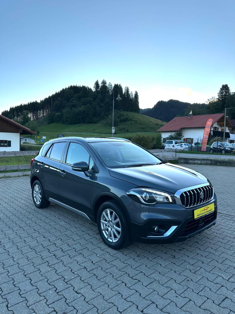 Suzuki (SX4) S-Cross+1.HAND+nur 27.000km+4x4BENZIN+HYB.