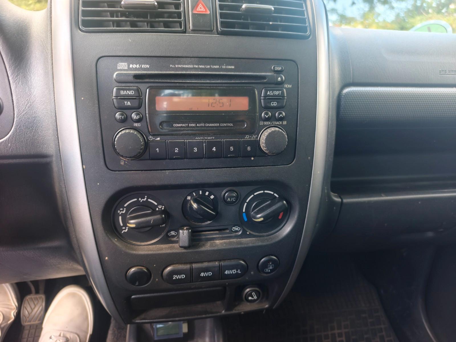 Suzuki Jimny 2006 — photo 12