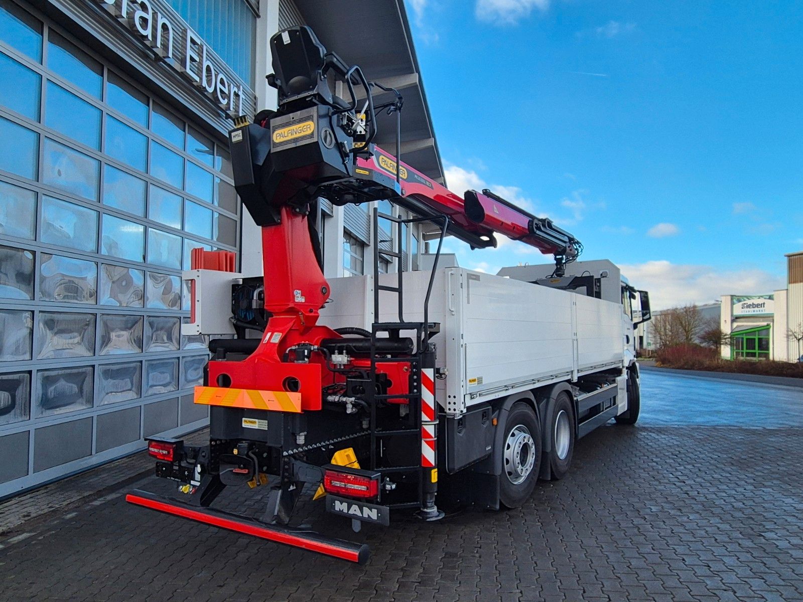 Fahrzeugabbildung MAN TGS 26.470 6x2-4 LL Baustoff Palfinger PK20.501L