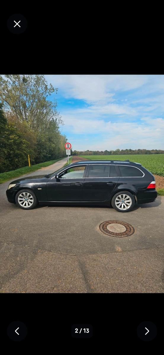 BMW 520 2009 — rear view