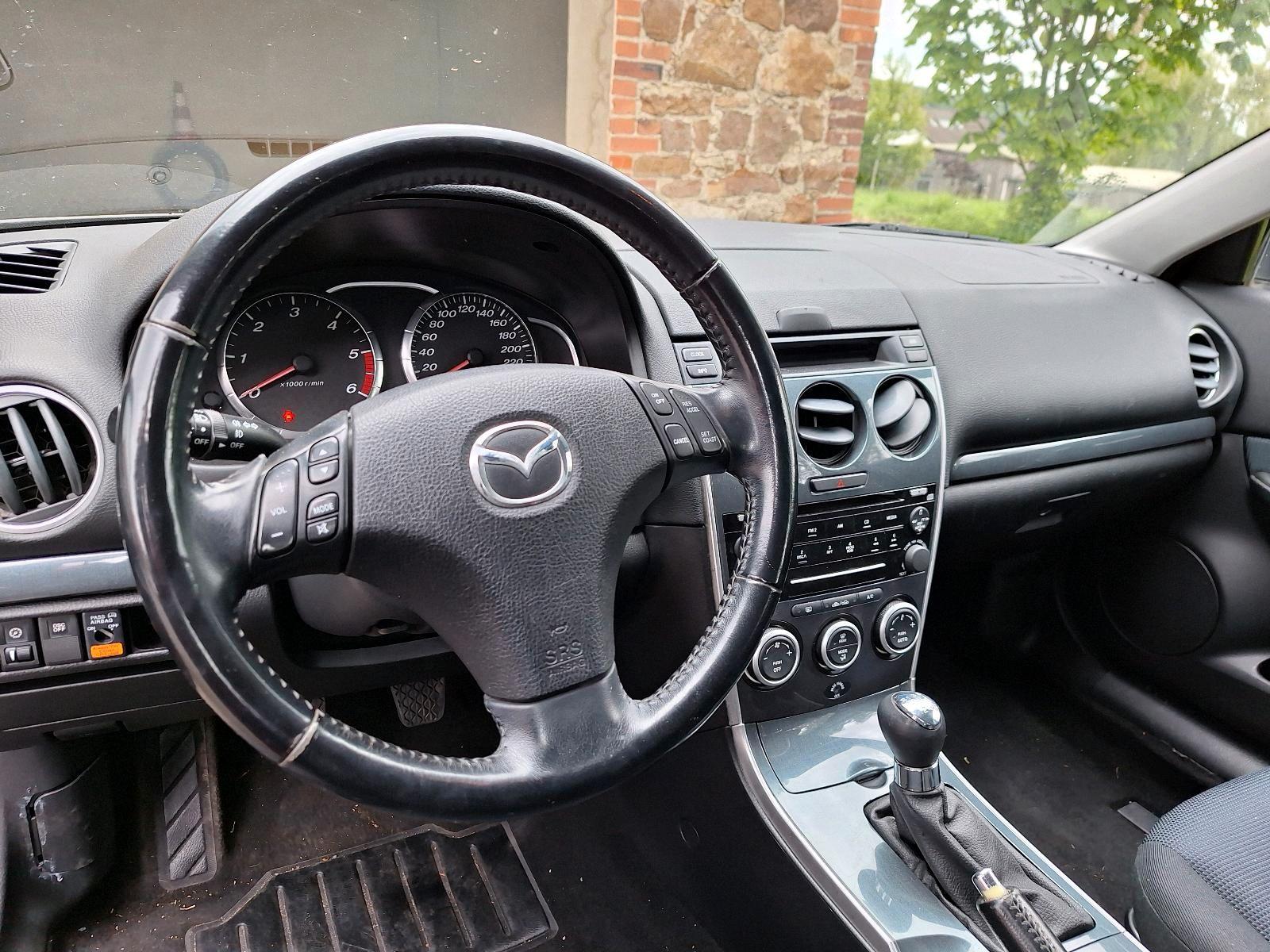 Mazda 2 2006 — photo 7