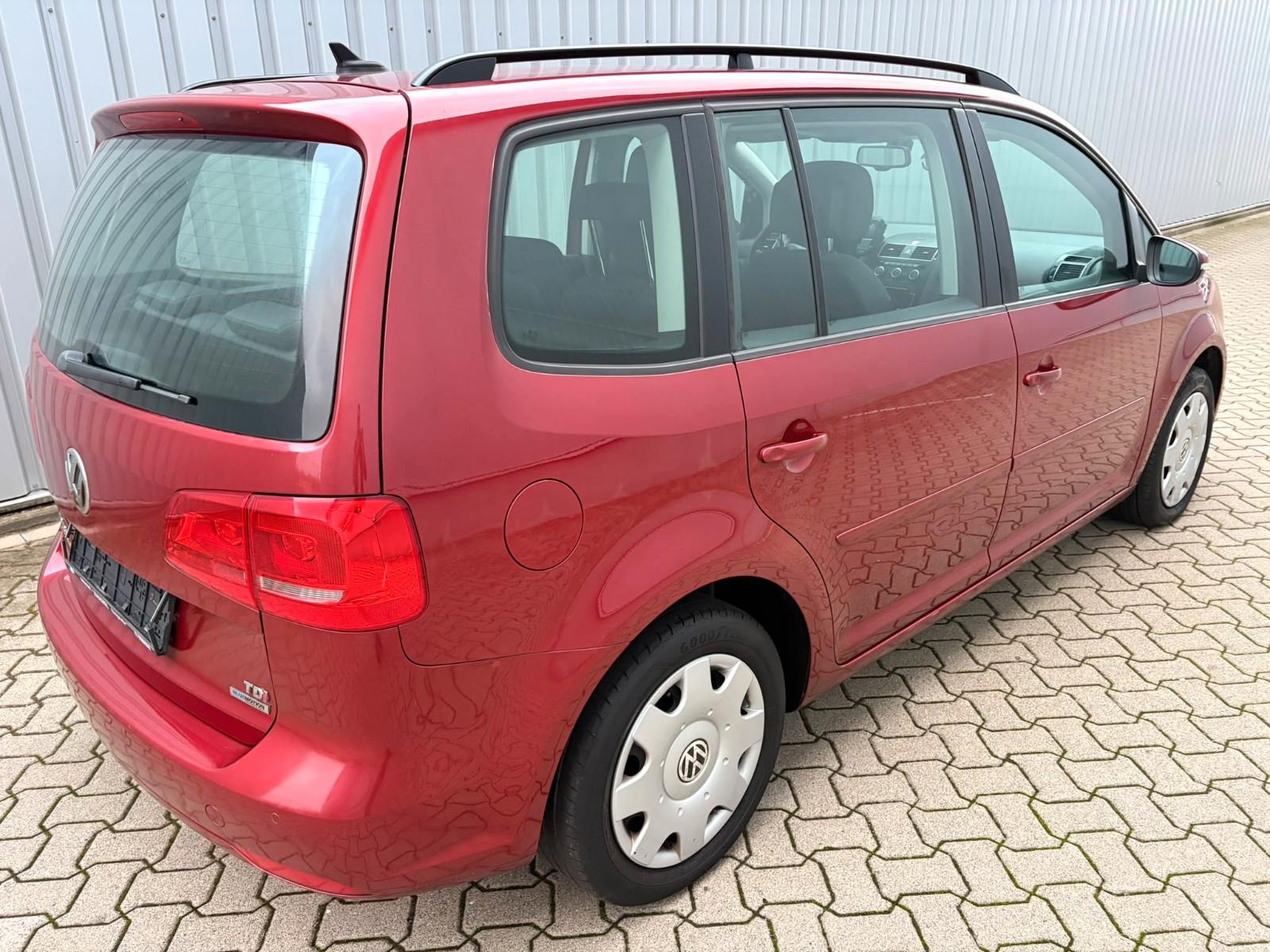 Volkswagen Touran 2014 — engine 1.598 cm³, 105 HP (77kW)
