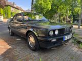 BMW 316i Cabrio Baur TC 2 - Scheckheft - 2. Hand - gebrauchte BMW 316 aus dem Jahr 1990