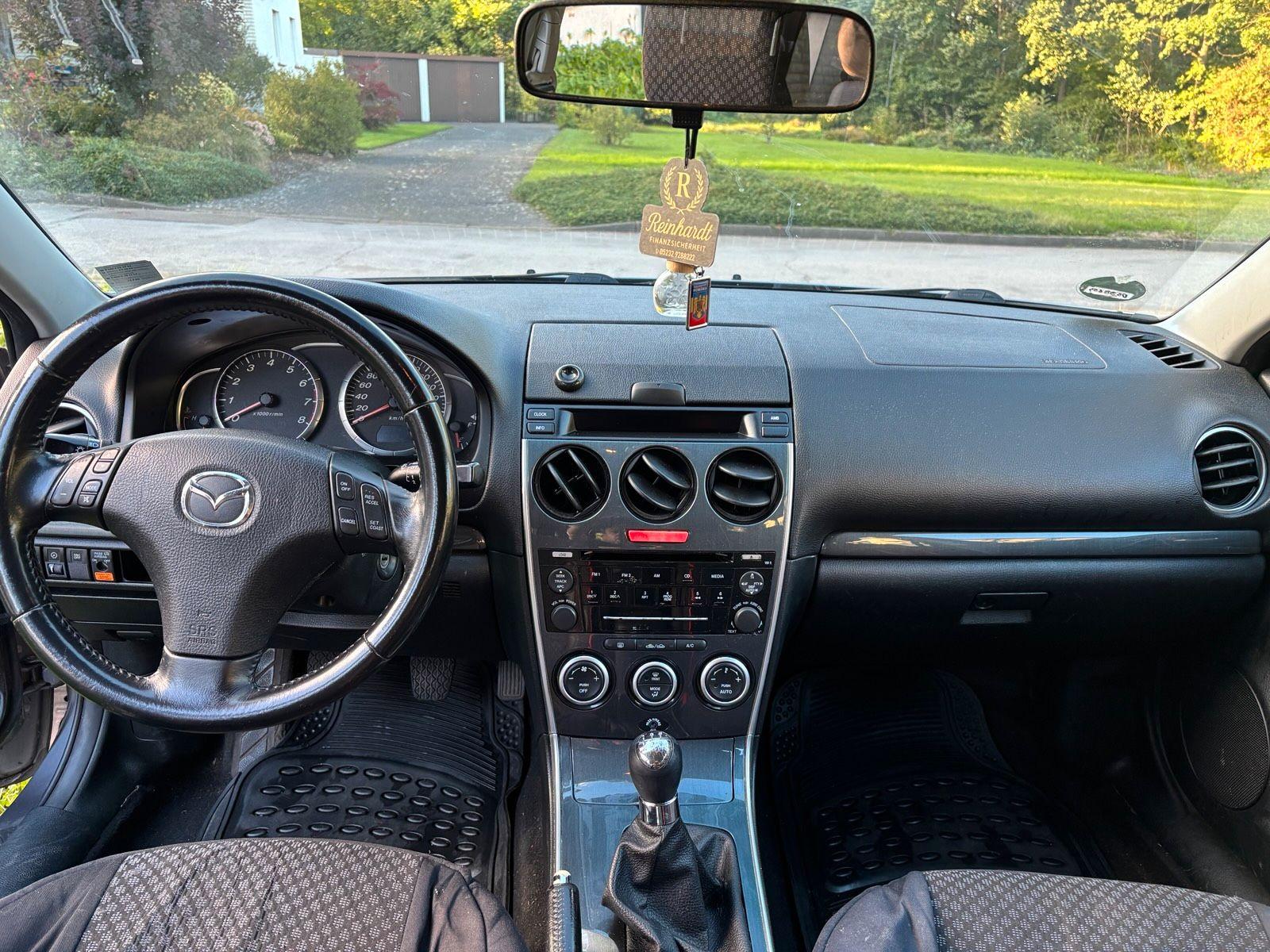 Mazda 2 2006 — photo 12