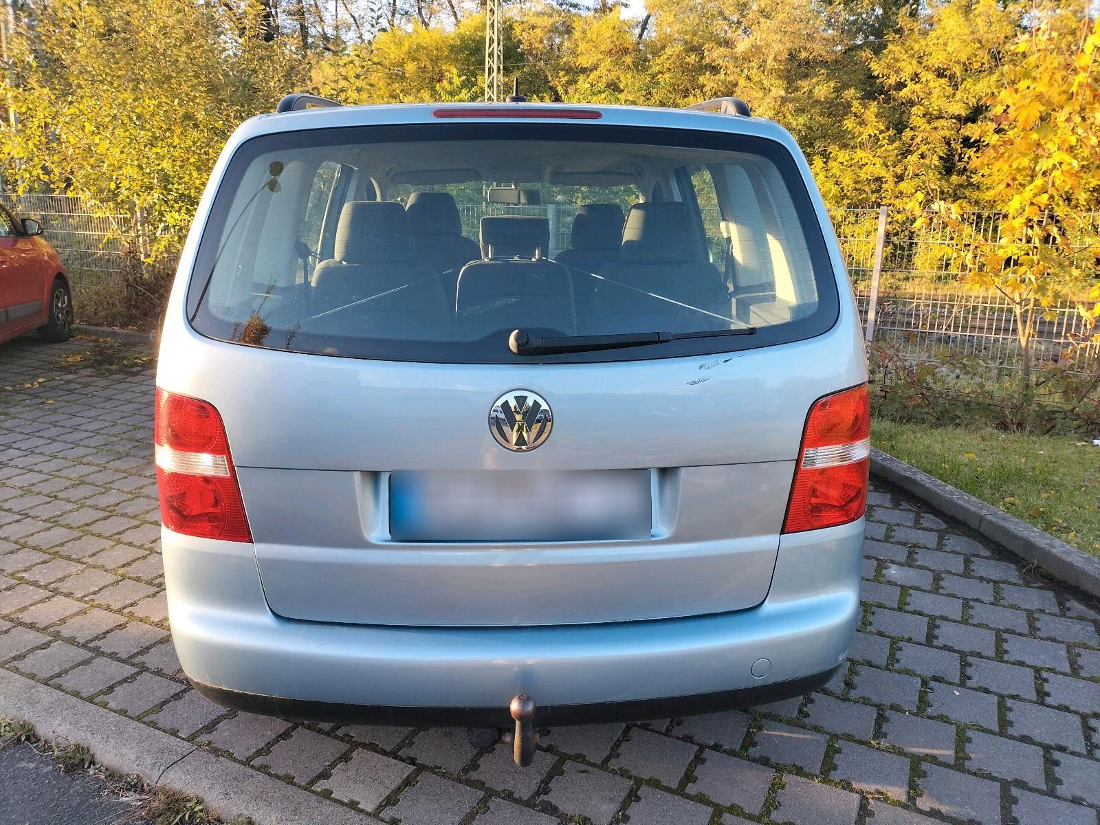 Volkswagen Touran 2006 — engine 105 HP (77kW)