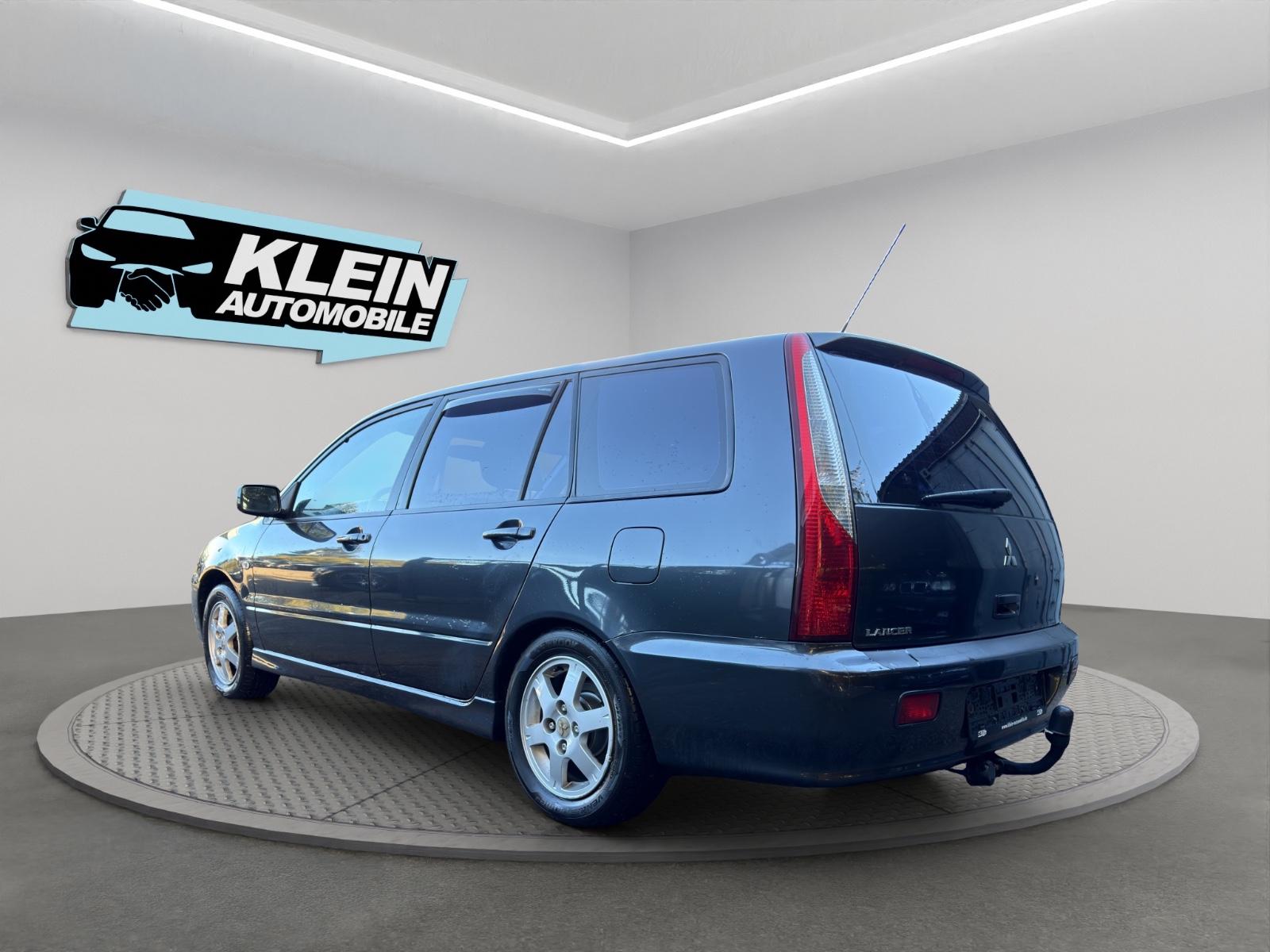 Mitsubishi Lancer 2005 — engine 1.584 cm³, 98 HP (72kW)