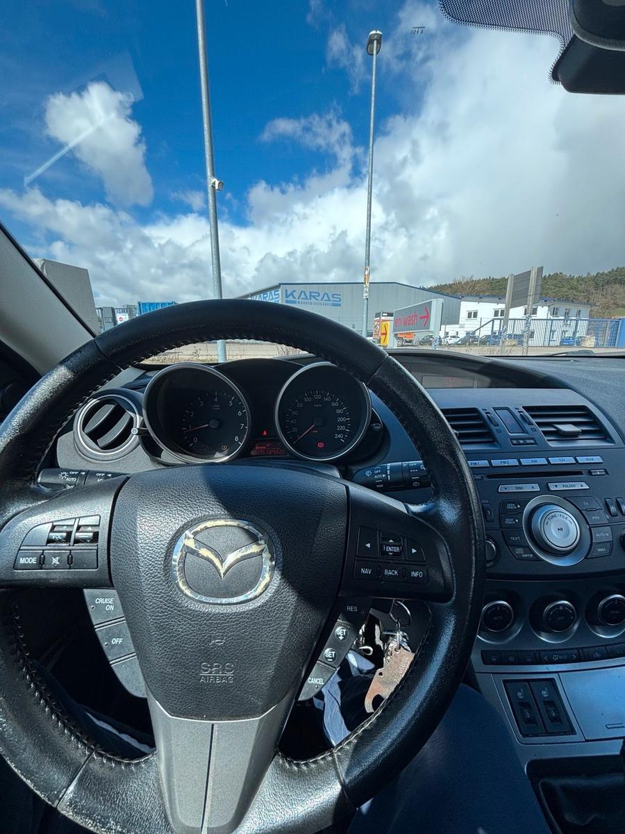 Mazda 2 2011 — photo 9