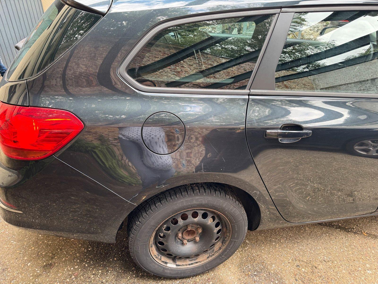 Opel Astra 2014 — photo 11