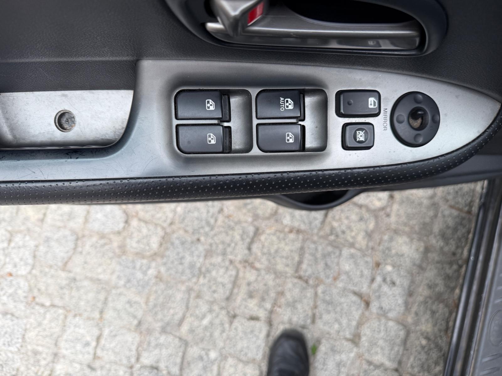 Kia Carens 2009 — photo 16