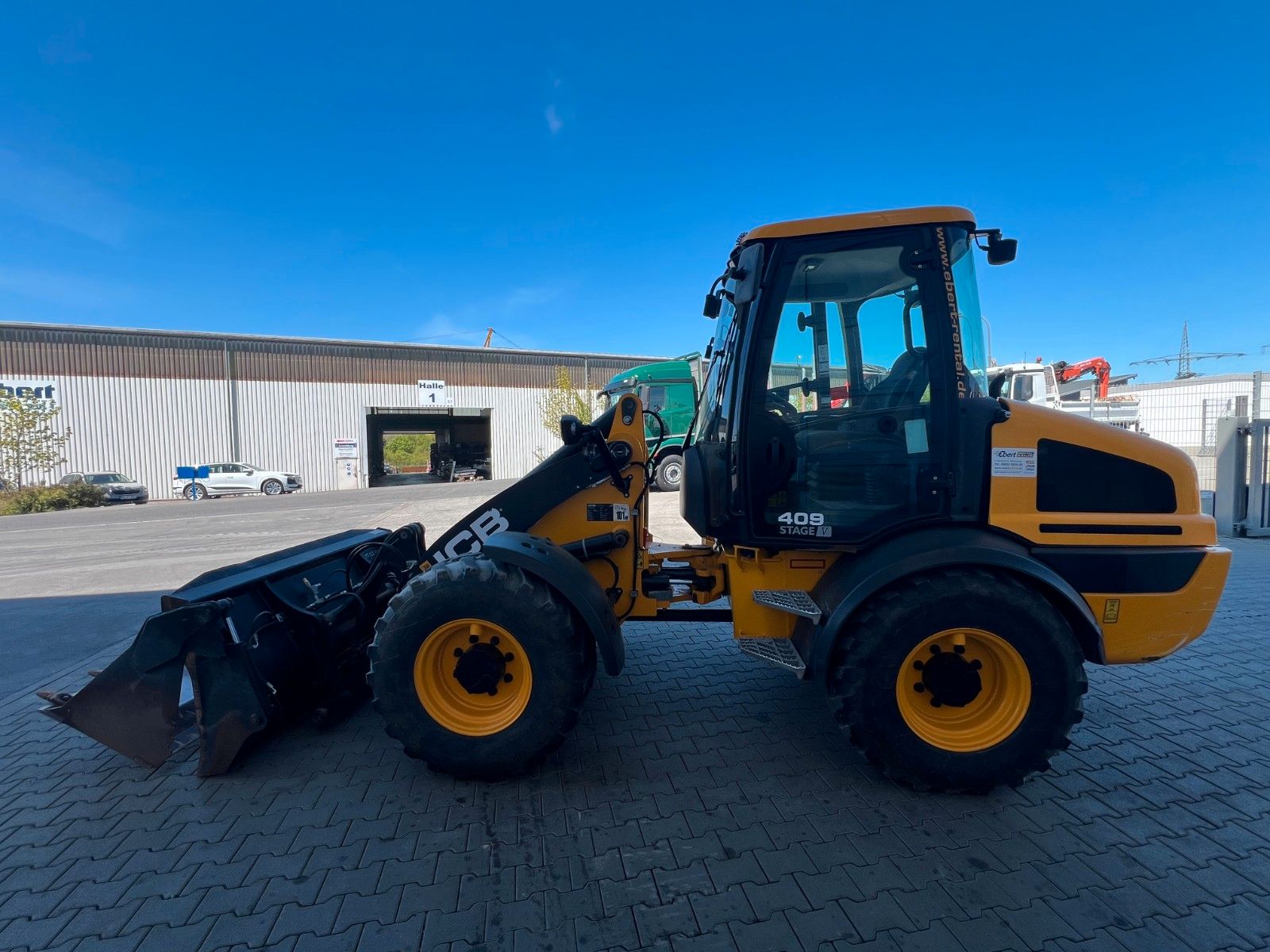 Fahrzeugabbildung JCB 409 SV / nur 758h! / Klappschaufel / Gabel