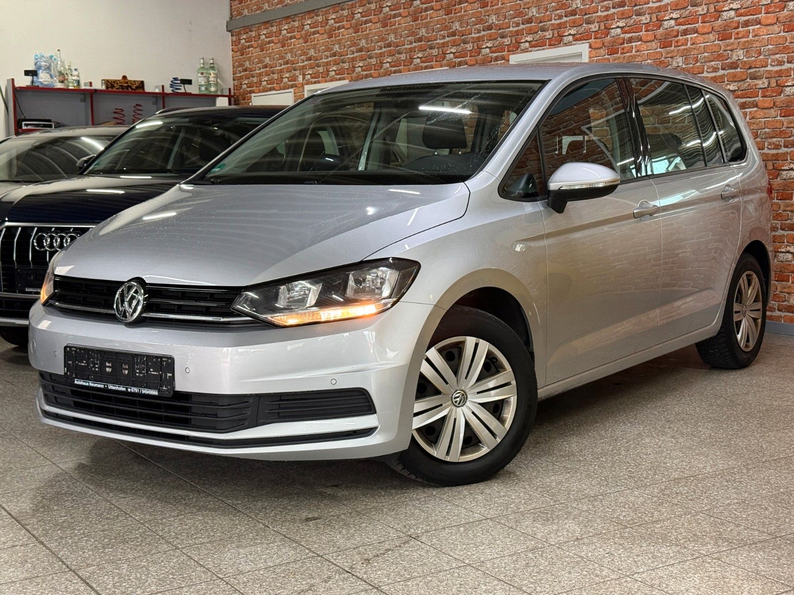 Volkswagen Volkswagen Touran 1.2TSI Navi-AHK-PDC-Klimaaut-7 S