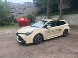 Toyota Corolla 1,8 Hybrid Team Deutschl Touring Spo... - gebrauchte Toyota Corolla aus dem Jahr 2024