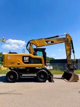 CAT M320F inkl. Grabenräumlöffel - CAT Mobilbagger M320