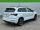 Skoda 150PS DSG Sportline NAVI ACC KAMERA eHK LM19"AHK - weiße Skoda Karoq