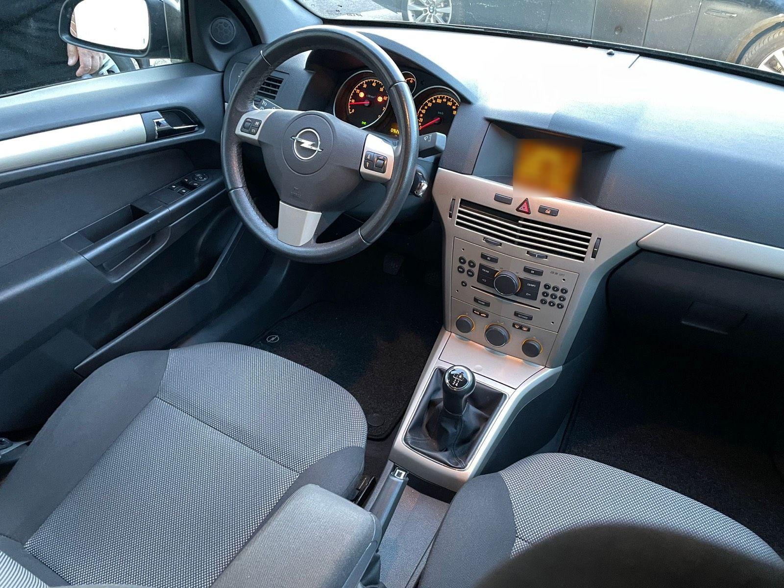 Opel Astra 2009 — engine 116 HP (85kW)