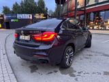 BMW X6 M50 M50d - - schwarze BMW X6 M50