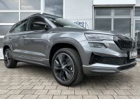 SKODA Karoq 1.5 TSI DSG Sportline PANO AHK 5 J. GAR bei Autohaus Landmann & Maier OHG