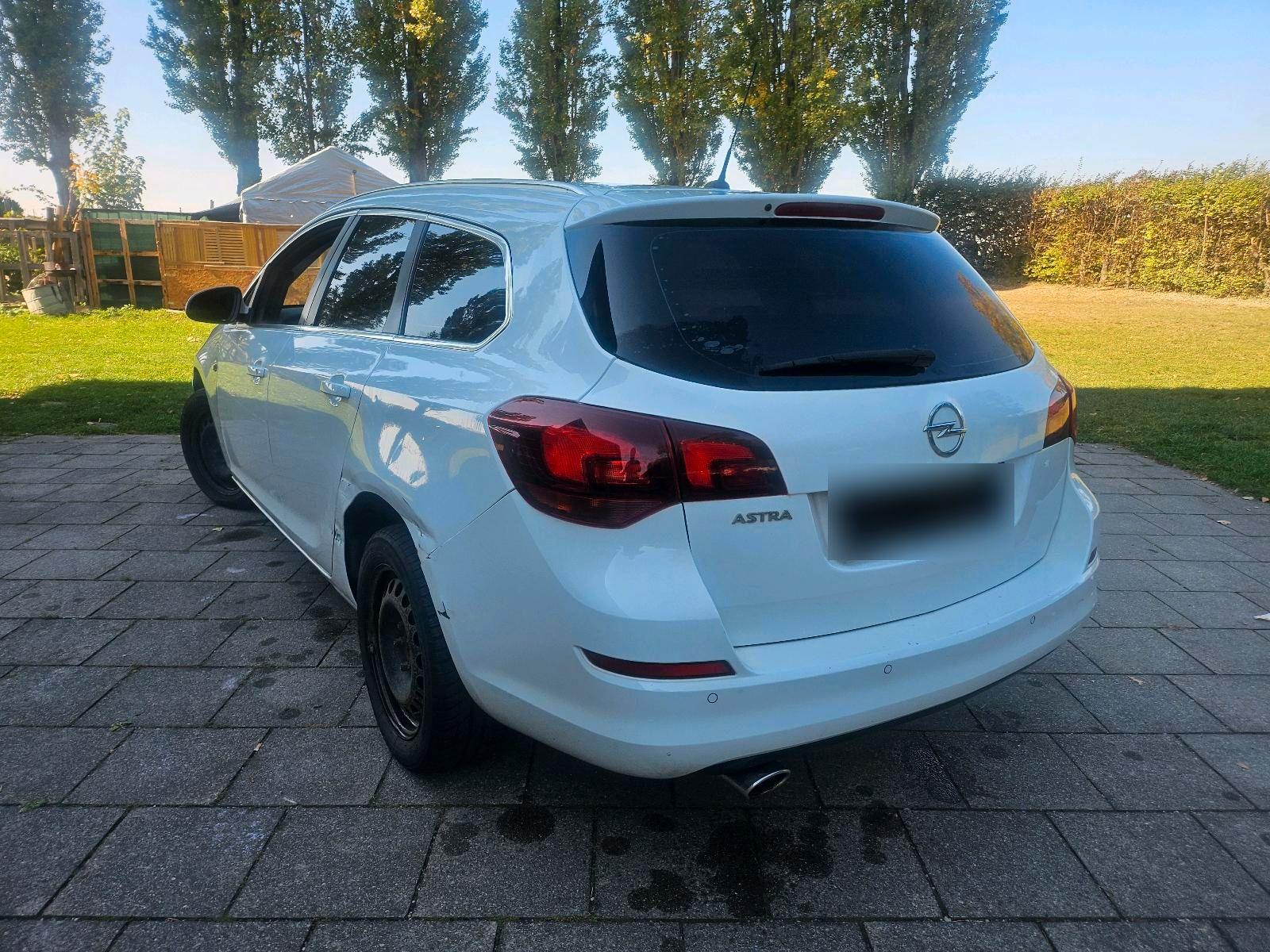 Opel Astra 2012 — engine 165 HP (121kW)