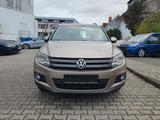 Volkswagen Tiguan Sport & Style 4Motion - mit Benzin-Antrieb: Beige, Schiebedach, Geländewagen