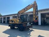 CAT M 318D HCR Abbruch Umschlag Verstellausleger - Angebote