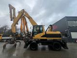 CAT M 318 C - CAT Mobilbagger M318