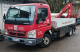 Mitsubishi Fuso Canter mit Ladekran am Heck - Ladekran