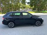 Skoda Fabia COMBI DRIVE 125 TÜV neu! - Skoda Fabia: Schwarz, Combi