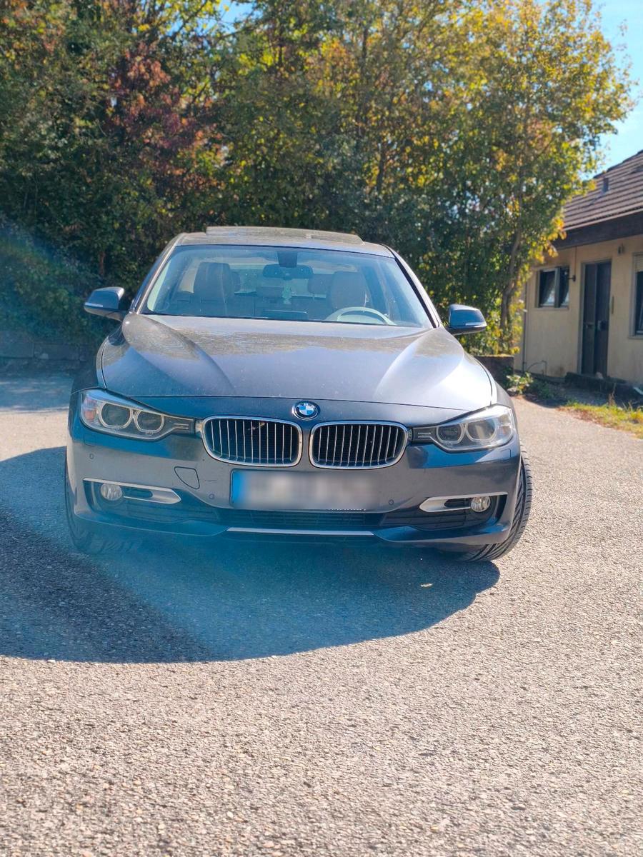 BMW 320 2012 — rear view