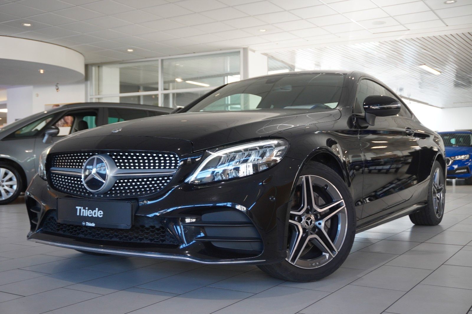 Fahrzeugabbildung Mercedes-Benz C 180 COUPE AMG LINE NAVI/LED/KAMERA/SPORT/SHZ