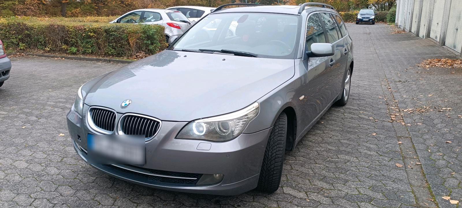 BMW 525 2009 — rear view